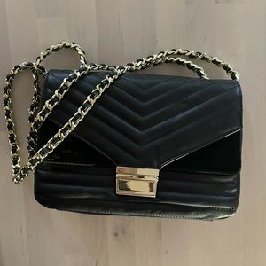 Double flap limited edition leather bag